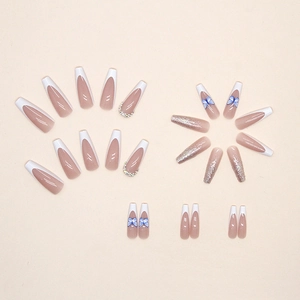 Faux ongles ballerine longs style french avec papillon bleu et diamants à paillettes
