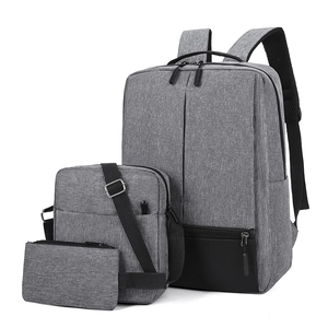 Three-piece grey Oxford cloth business backpack set with USB charging and laptop compartment