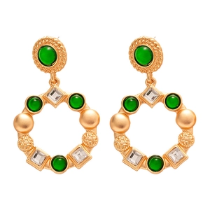 Vintage gold hollow round earrings with green and white gems in a classic French style