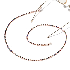 Colorful rhinestone eyewear chain with gold metal links and anti-slip rubber loops