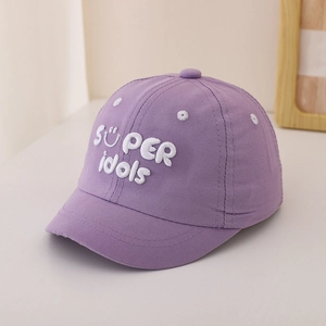 Detail of purple cotton baseball cap featuring white SUPER idols embroidery and smiley face