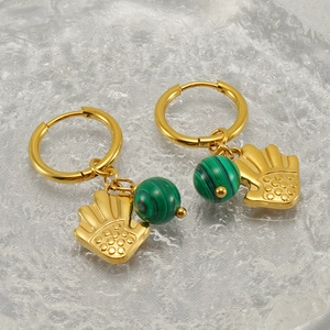 Golden hoop earrings with textured green stone bead and palm leaf charms for women