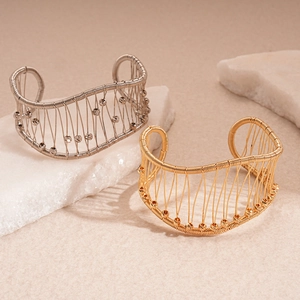 Bracelet manchette géométrique tissé en maille métallique dorée et argent