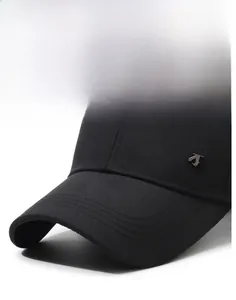 Detail of the stiff brim and metallic Z logo on this black cotton baseball cap for men