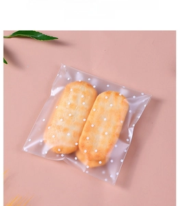 Close-up of matte polka dot self-adhesive snack bag made of food-grade material