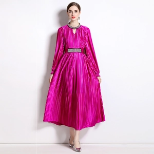 Elegant rose red pleated maxi dress with beaded waist and long sleeves in silky fabric