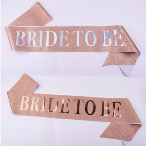 Detailed macro view of rose gold glitter sash featuring the Bride To Be printed lettering