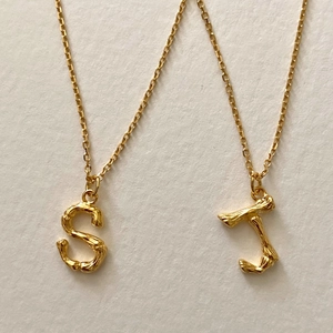 925 silver gold-plated necklace with textured bamboo style letter S and T pendants