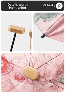 Detail view of the artistic oil painting umbrella with gold handle and durable black tips
