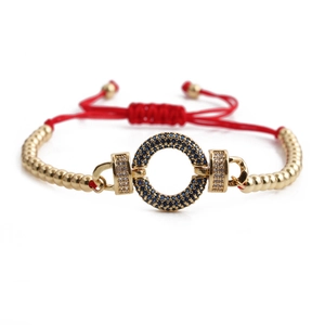 Adjustable red rope bracelet with gold copper beads and blue zircon evil eye charm