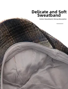 Vue détaillée du bandeau en coton et du tissu en laine à chevrons de la casquette rétro