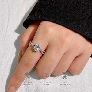 Detail of 1ct D color moissanite ring in 925 sterling silver with GRA certificate info