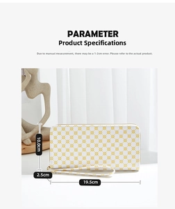Close-up of white long zipper wallet with yellow floral pattern and wrist strap