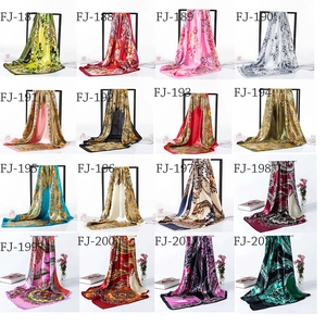 Collection of 16 colorful satin square scarves with various floral and paisley patterns