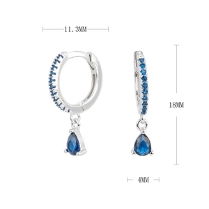 Detailed view of silver drop earrings featuring deep blue sapphire stones and 18mm height
