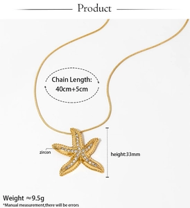 Detail showing dimensions of the gold starfish necklace with zircon, length 40cm plus 5cm