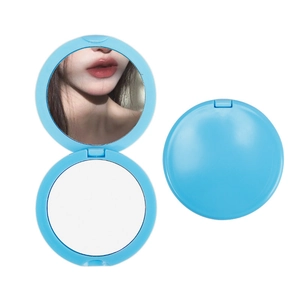 Blue foldable macaron-style pocket mirror shown in open and closed positions on white background