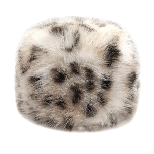 Close-up of thick plush faux fur leopard print bucket hat with soft winter texture