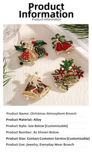 Detail of Christmas brooches with festive red and green enamel and crystal inlay