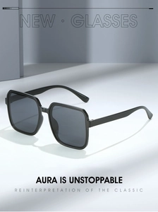 Close-up of minimalist black square sunglasses with high-quality polished frames