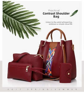 Detailed set of four burgundy pebbled leather handbags with chic woven texture accents