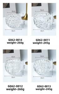 Detail view of four textured glass candle holders with measurements and dimensions