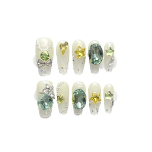 Green glitter press-on nails set with heart rhinestones and butterfly charms for women