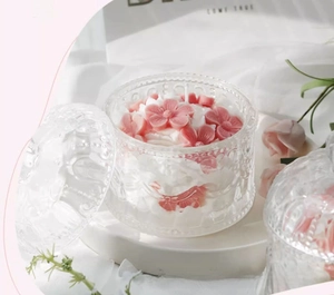 Detailed relief glass jar with cherry blossom soy wax candle for home fragrance