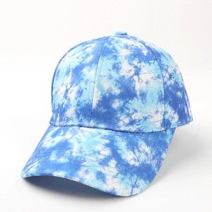 Detail of blue and white tie-dye baseball cap featuring six-panel canvas construction