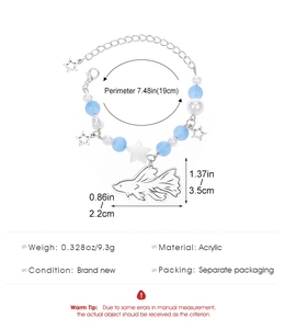 Blue acrylic beaded bracelet featuring star charms and a fish pendant with dimensions