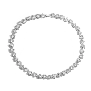 Close-up of silver-toned heart necklace links featuring pavé-set shimmering zircon stones