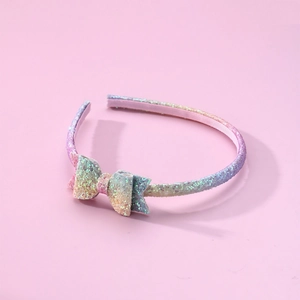 Rainbow sequin bow headband for girls with non-slip fabric lining and glitter finish