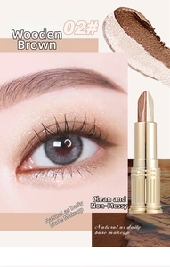 Macro detail of dual-color eyeshadow stick 02 Woody Brown with pearl finish and shimmer
