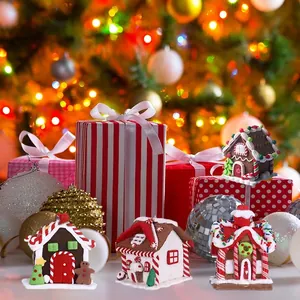 Set of 4 cute gingerbread house Christmas tree ornaments with festive resin details