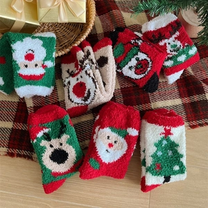 Thick coral fleece Christmas socks with Santa and reindeer patterns for winter warmth