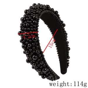 Detail view of 4.2cm wide headband with black mixed-size faux pearls and fabric finish