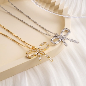 Elegant bow pendant necklace with zircon stones in gold and silver finish options