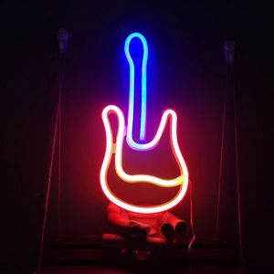Guitar LED neon sign glowing in red, blue, and yellow with wooden stand for wall decor