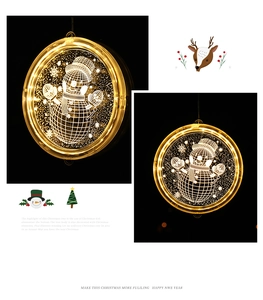 Detail view of 3D acrylic Christmas reindeer LED lamp with warm yellow light pattern
