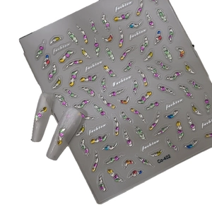 Autocollants 3D pour ongles avec pierres précieuses colorées et bordure métallique Co-402