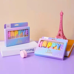 Colorful HAPPY birthday letter candles in candy colors for party cake decoration