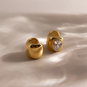Minimalist 18K gold-plated teardrop zircon ear cuff set with wave shadow background