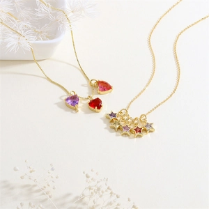 18K gold-plated necklaces with colorful heart and star-shaped zircon pendants on beige background