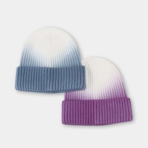 Fashionable tie-dye knit beanie hats in blue and purple gradient ribbed winter styles