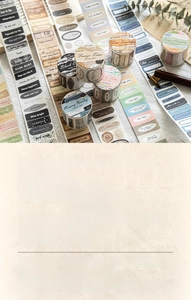 Detail of vintage white kraft paper die-cut tape for DIY scrapbooking and journal decoration