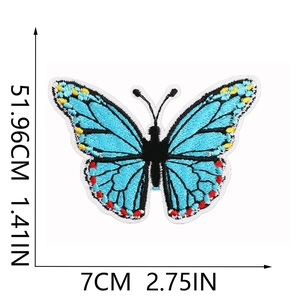 Detailed view of blue butterfly embroidery patch with dimensions 7cm by 1.41in