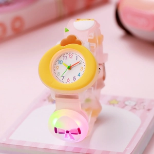 Luminous kids watch with yellow cartoon chicken face and pink strap on pink background