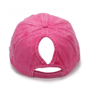 Detail of water-drop ponytail hole on washed rose pink cotton baseball cap back