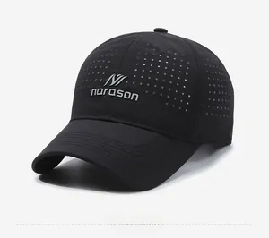 Detailed close-up of breathable laser-cut side vents on the black sports baseball cap