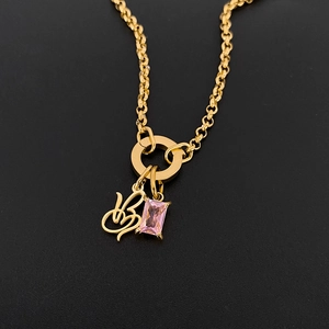 Elegant 14K gold plated titanium steel necklace featuring pink gemstone and letter B charms